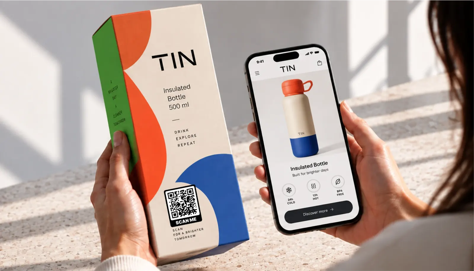 A TIN bottle box with a QR code next to a phone showing the product page it opens