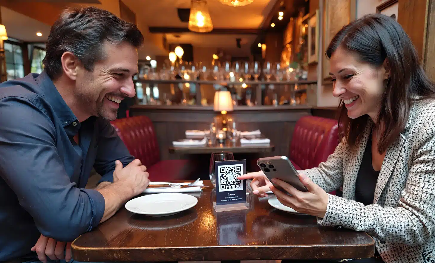 Loyal customers scanning QR code at table